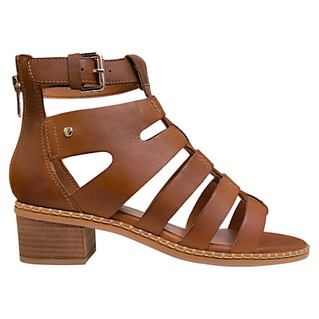 PikolinosBraune Keilsandalette mit bunten, harmonisch abgestimmten Lederriemen, feinen Ziernähten und heller Sohle – elegant, sommerlich und besonders leicht gestaltet. PikolinosBraune Keilsandalette mit bunten, harmonisch abgestimmten Lederriemen, feinen Ziernähten und heller Sohle – elegant, sommerlich und besonders leicht gestaltet.