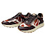Carmela 164360 Damen-Sneaker in Brown aus Leder mit dunkelbraunen, weißen und rostbraunen Fell-Optik-Details, goldfarbenem Reißverschluss und heller Plateausohle. Bequemer Leder-Sneaker mit Schnürung, seitlichem Reißverschluss, herausnehmbarer Einlegesohle und normaler Passform – erhältlich bei Kassedy.de in Oldenburg.